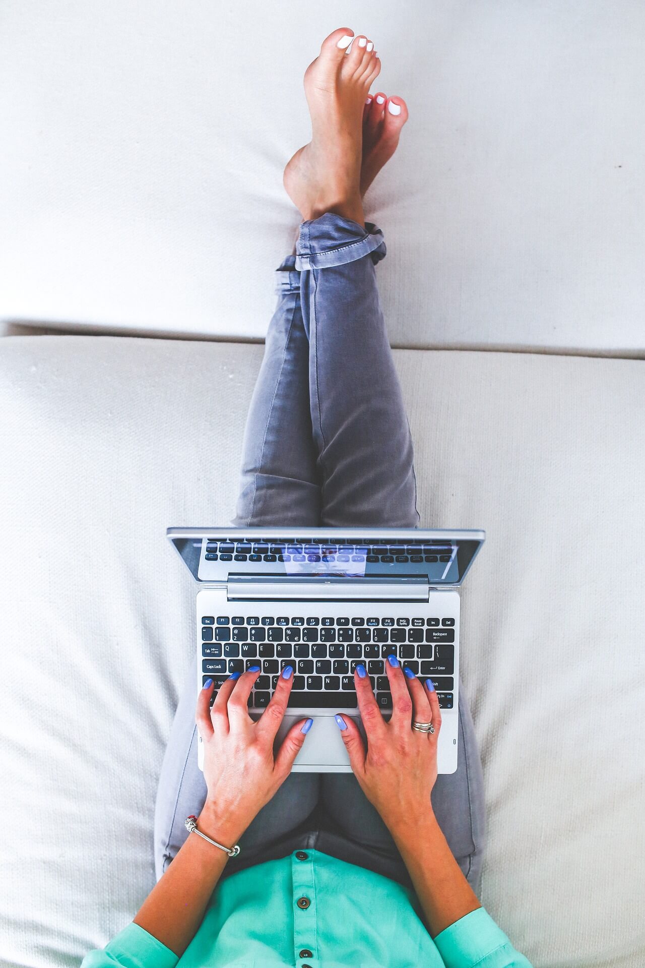 Woman working remotely with laptop